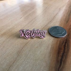 Nothing enamel pin
